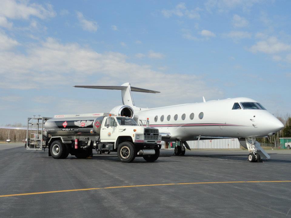 Fuel Truck Next to Jet